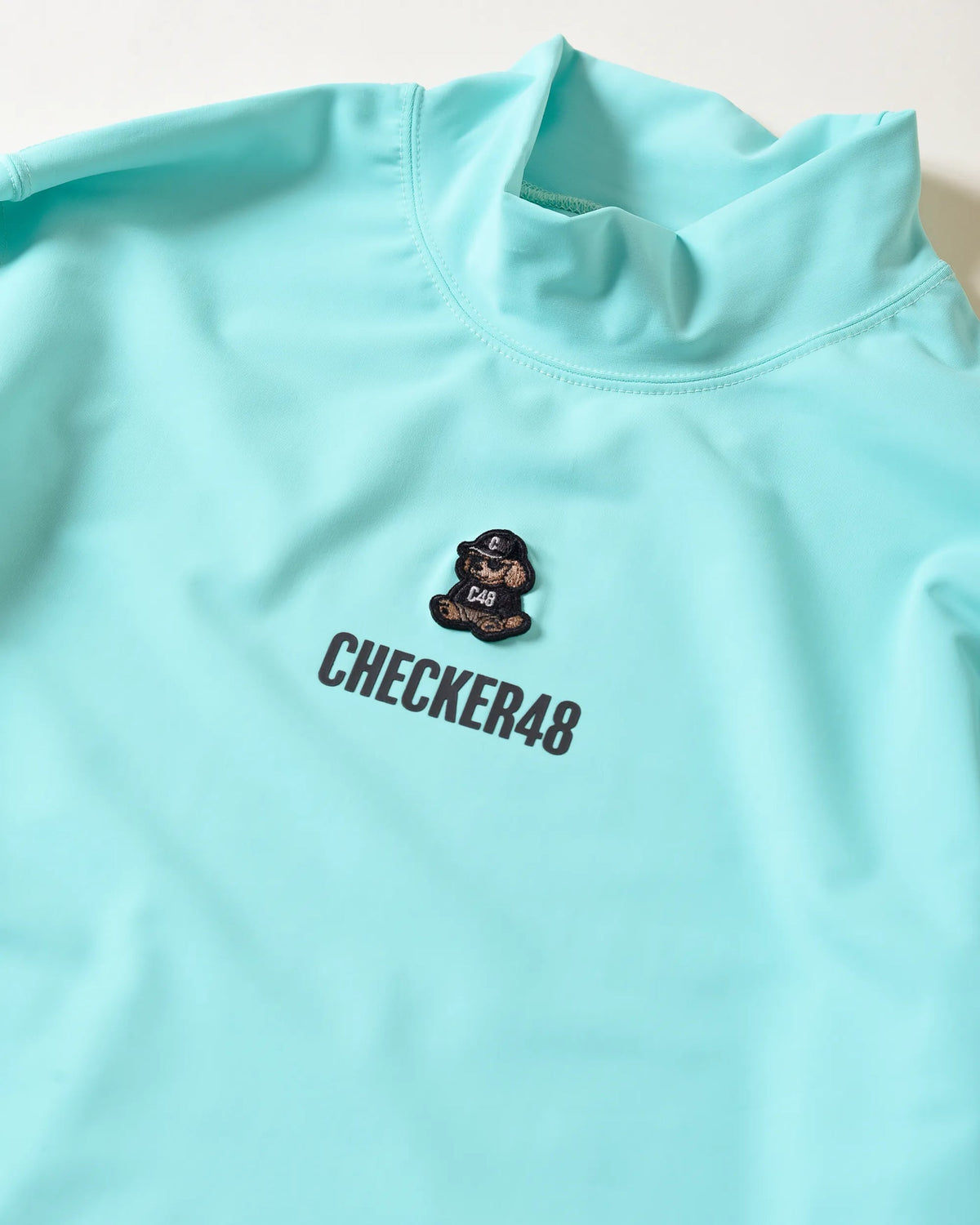 【CHECKER48】LESS SEE-THROUGH MOCK SHIRTS 長袖ハイネック TURQUOISE（CHE-C4800A001）